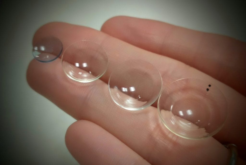 Different scleral and RGP lenses side by side from small to large diameter